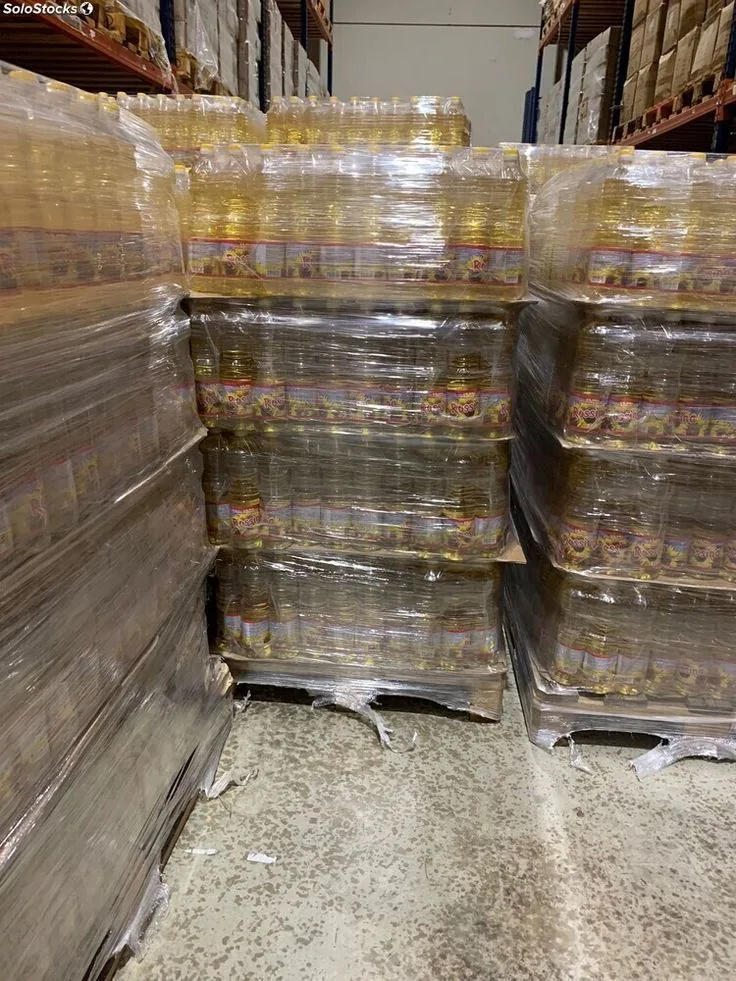 Palette d'huile Puget filmée en entrepôt — export Afrique Euro Africa FMCG